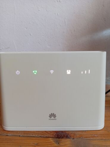 kompüter çantası: Huawei brendi tərəfindən istehsal edilmiş bu ağ rəngli mobil internet