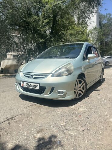 радиатор опель зафира а: Автомобиль Honda Fit светло-зеленого цвета с пятиспицевыми