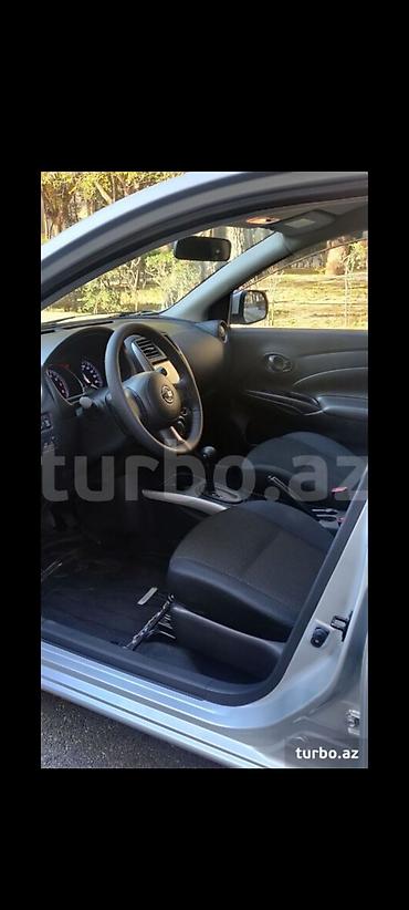 tesla model s: Nissan Sunny: 1.2 l | 2012 il Sedan — 8