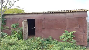 Qoşqular: Vaqon -vaqon barter olunur. Materialı dəmirdən olan böyük su çənləri — 2