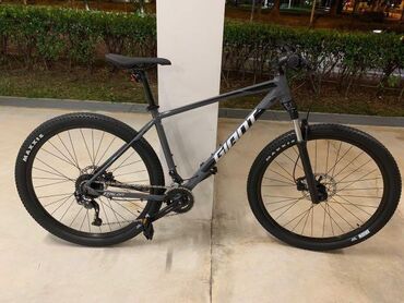 Велосипеды: Продаю велосипед GIANT TALON 2 (цвет темный) Шины 29 Размер L 2