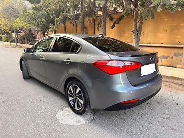tesla model s: Kia Cerato: 1.6 l | 2014 il Sedan — 4