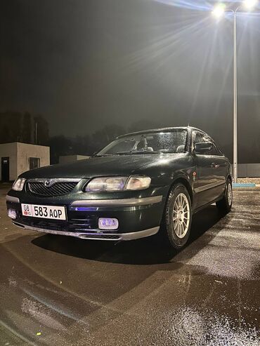 авто 312: Mazda Capella: 1999 г., 2 л, Механика, Бензин, Седан