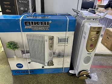 Масляные обогреватели: Масляный обогреватель Кол-во секций: 10 и более, Встроенный вентилятор, Несколько режимов мощности, Отключение при падении — 2