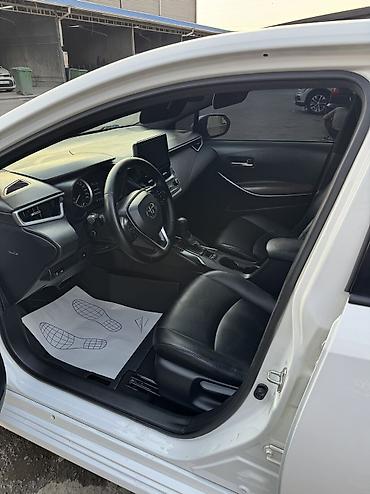 салон w124: Toyota Corolla: 2019 г., Гибрид, Седан — 2