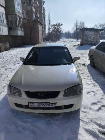 Mazda: Mazda 323: 1999 г., 1.5 л, Механика, Газ, Седан