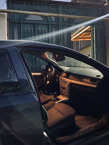 mercedes 160 a: Opel Astra H, 5 qapılı hetçbek - Kuzov: hetçbek, tünd mavi rəng - — 4