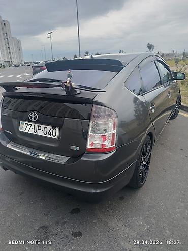 prius salon: Toyota Prius (2-ci nəsil) hibrid hetçbek - Kuzov: hetçbek, tünd boz — 3