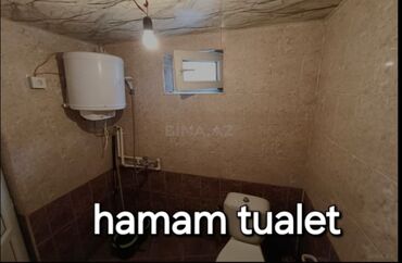 Binalar: Binə qəsəbəsində yerləşən “Vasaq” İdman Klubu və yanında ayrıca — 10