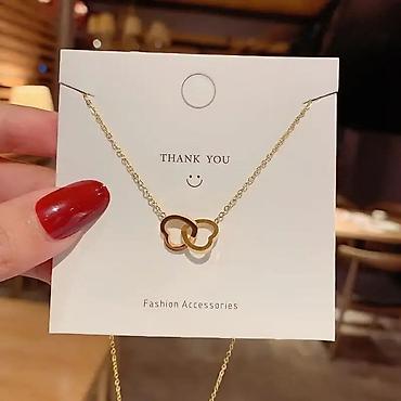 Ogrlice: Ogrlica sa dva isprepletena srca
1300 din — 10