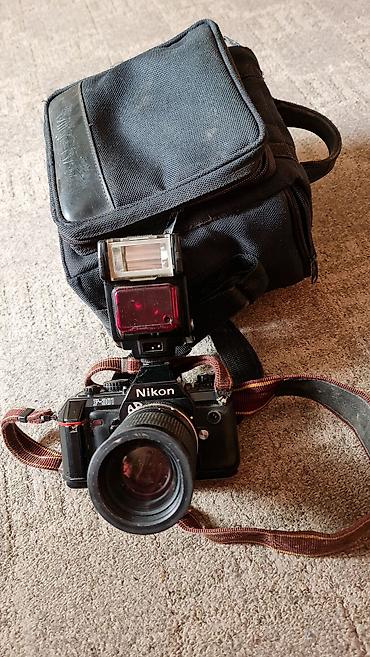 ploca za gramofon: Nikon F-301 analogni SLR fotoaparat sa priborom - Telo: Nikon F-301 — 10
