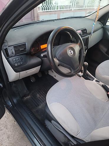 Fiat: Vlasnik 7 godina,2 kljuca,redovno odrzavan,do velikog servisa na lalafo.rs — 14 Fiat: Vlasnik 7 godina,2 kljuca,redovno odrzavan,do velikog servisa — 14