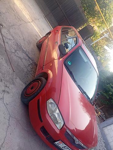Транспорт: Mazda 323: 1998 г., 1.5 л, Автомат, Бензин, Хэтчбэк — 3