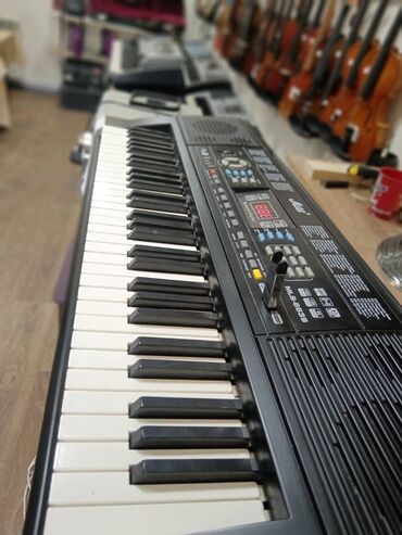 sintezator qiymeti: Elektro pianino flashka yeri var mp 3 oxudur,etrafli6830520cine yigin