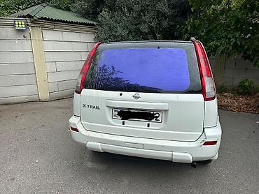 Nissan: Nissan X-Trail (I nəsil) – ağ rəngli, 5 yerlik SUV Texniki və — 4