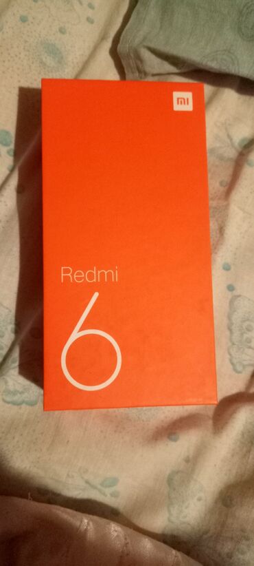 Xiaomi: Xiaomi Redmi 6, 32 ГБ, цвет - Черный, 
 Сенсорный, Отпечаток пальца, Две SIM карты