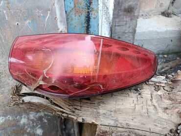 фара некся 2: Задний фонарь автомобиля (левый), универсальный блок в красном корпусе