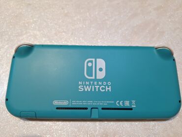 nintendo wii: Nintendo Switch Lite oyun konsolu, mavi rəngdə.super vəziyyətdədir