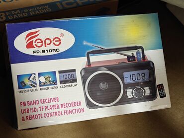 Аудиоплееры: Продаю Радиоприемник EPE fp-910rc. новый, в коробке. Имеет микрофон и