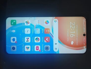 купить холодильник недорого с доставкой: Smartfon – tam ekranlı, ön kamera üçün mərkəzdə deşikli displeyli