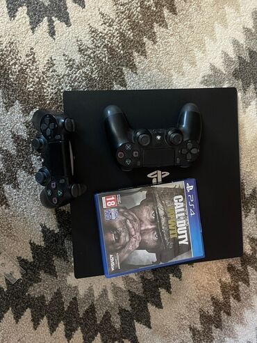 хвох сериес с: PlayStation 4 Pro (черная, версия с тройным «слоем» корпуса). Комплект