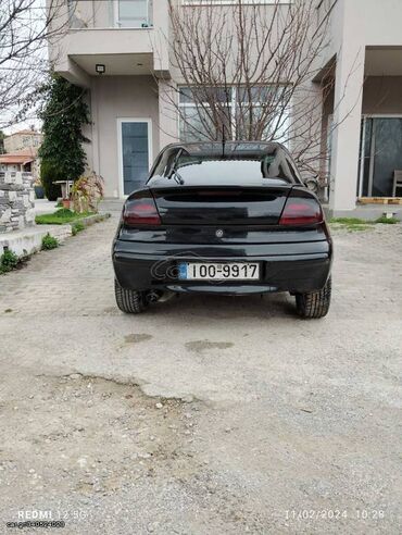 Opel Tigra: 1.4 l | 2002 year 211000 km. Coupe/Sports