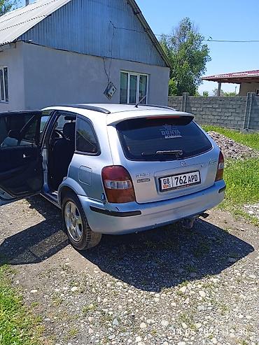 mazda 323 2003: Mazda 323: 1999 г., Бензин, Универсал — 3