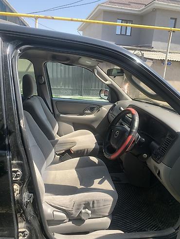 на кару: Mazda Tribute: 2000 г., 3 л, Автомат, Бензин, Кроссовер — 4