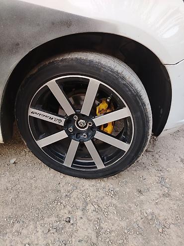 17 şam disk: QO Racing yüngül alaşımlı disklər – 4 ədəd komplekt — 1