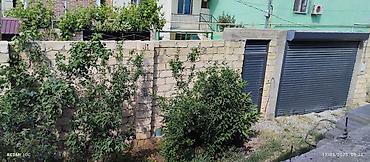 rahat emlak: - İki mərtəbəli daş tikili ev - Fasadda kəsme daş (kubik) ilə hörgü — 2