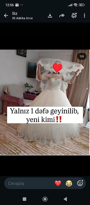 Ağ gəlinlik dəsti - Klassik A-kesim, çoxqatlı tull ətəkli model - Üst