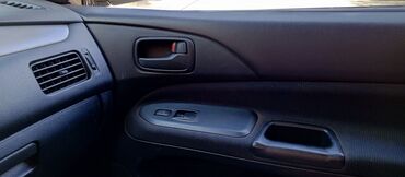 Mitsubishi: Mitsubishi Lancer: 2002 г., 2 л, Автомат, Бензин, Седан