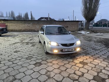 Mazda: Mazda 323: 2002 г., 1.6 л, Механика, Бензин, Хэтчбэк