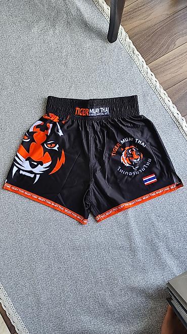 тигил: Комплект экипировки Tiger Muay Thai - Состав: футболка и шорты для — 3
