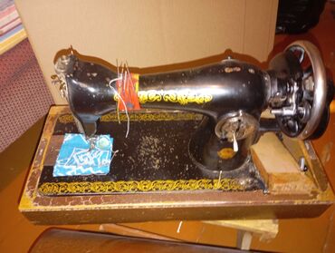 ремонт швейных машин: Тигүүчү машина Кол менен