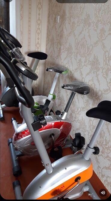 Velotrenajorlar: İdman zalı üçün nəzərdə tutulmuş stasionar velosiped. Evdə fitnes