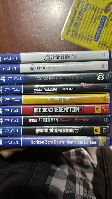 PS4 (Sony Playstation 4): Gran Turismo 20 Spiderman 30 GTA 25 Assasins Creed Odyssey 30 Mortal