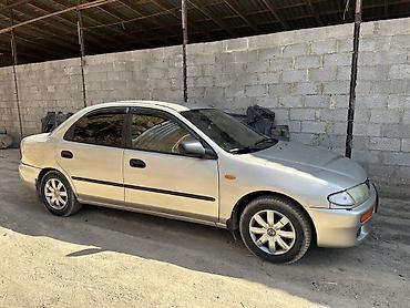 mazda axela: Mazda 323: 1996 г., 1.6 л, Механика, Бензин, Седан — 2