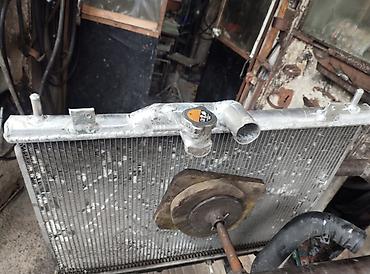 pelet sobası: Radiator təmiri. Arqon və qaynaq işlərinin görülməsi. Avtomobil — 2
