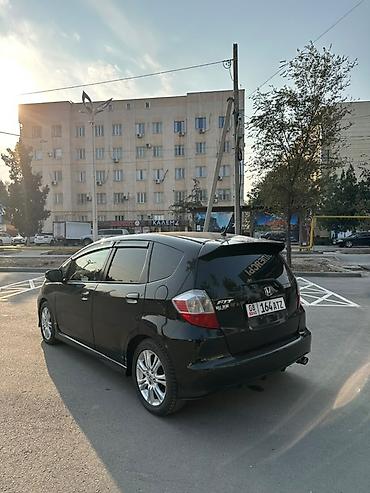 самое бортовой: Honda Fit: 2009 г., 1.5 л, Автомат, Бензин, Хэтчбэк — 5