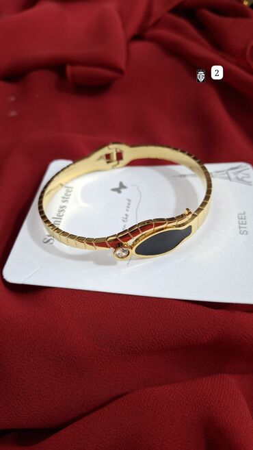 Bilərziklər: Qızılı rəngli, paslanmayan poladdan (STEEL) bəzək bilərziyi. Oval -da lalafo.az — 17 Bilərziklər: Qızılı rəngli, paslanmayan poladdan (STEEL) bəzək bilərziyi. Oval — 17