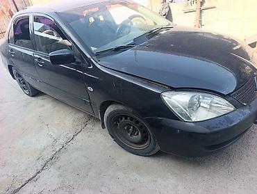 двери виш: Авторазбор Mitsubishi Lancer (седан, поколение 2003–2007). 1.6 бензин — 5