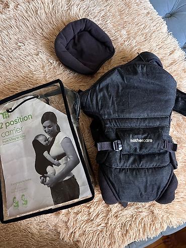 kenquri: MotherCare brendine mexsus olan kenquru (usaq dasiyicisi).Istifade — 2