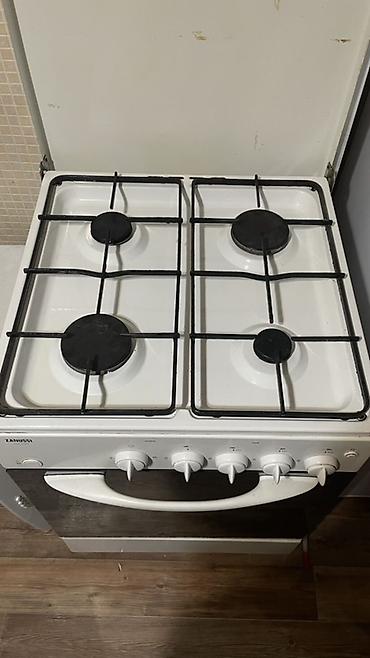 зануси: Газовая плита Zanussi ZCG 5500 - 4 газовые конфорки разного диаметра — 4