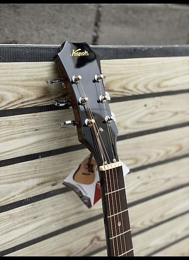 бир: Акустическая гитара Karok, форма корпуса Dreadnought. - Верхняя дека — 1