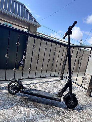 drift car elektrikli scooter: Elektrik skuter – qara rəngli, yığcam və yüngül konstruksiya — 3