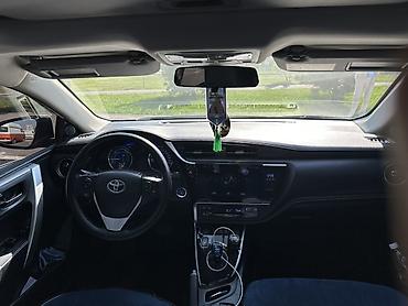 Toyota: Toyota Corolla: 2019 г., 1.8 л, Вариатор, Гибрид, Седан — 7