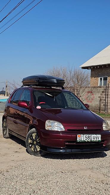 Honda: Honda Logo: 2000 г., 1.3 л, Вариатор, Хэтчбэк — 2