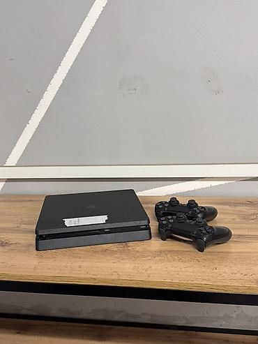 nintendo controller: PlayStation 4 Slim + 2 геймпада DualShock 4 Комплект: - Консоль Sony — 1