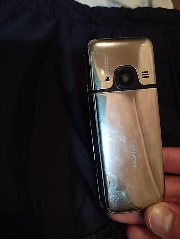 retro telefon: Nokia 6700 Slide, < 2 GB Memory Capacity, rəng - Gümüşü, Düyməli — 4